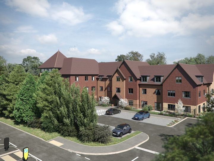 CGI of the Milton Keynes development, a brick care home behind a tree-lined road junction